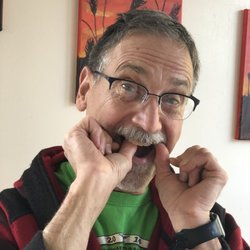 Randall K McVey, DMD - Dr. McVey shows off his flossing skills.