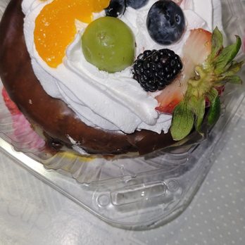 Donut Cravings - Mine was a reg donut topped with cream and fresh fruit. - Desserts Near Me - Riverside, California