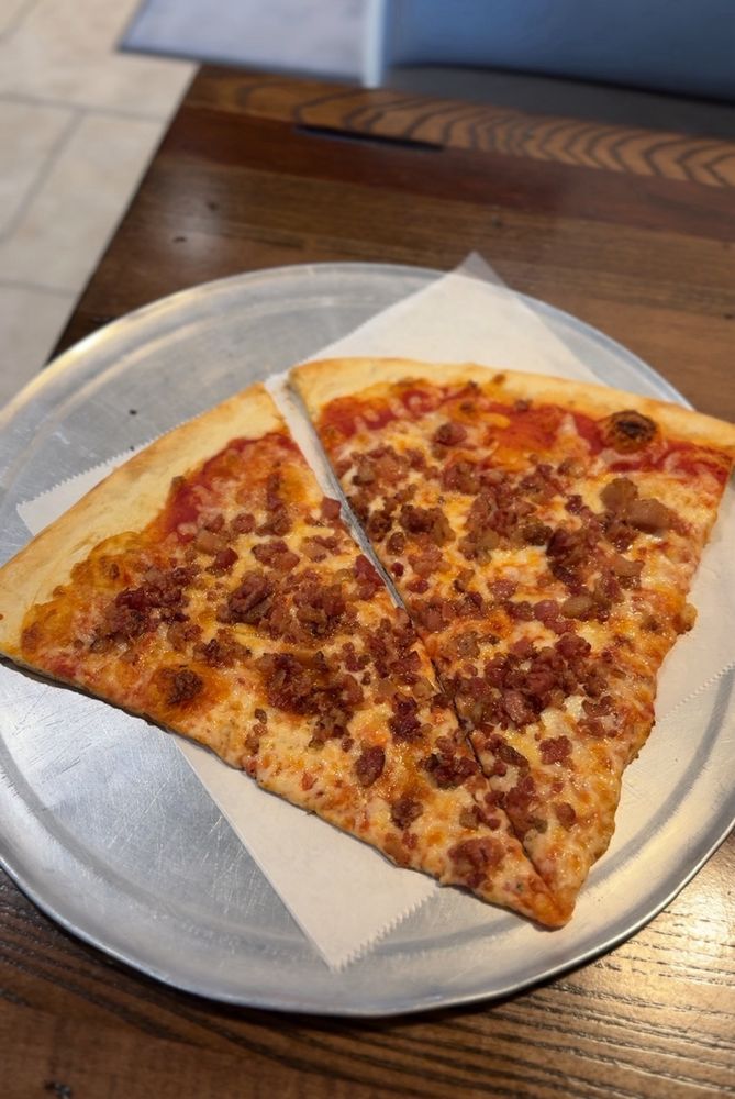 Johnnys Pizza Fuquay Logo