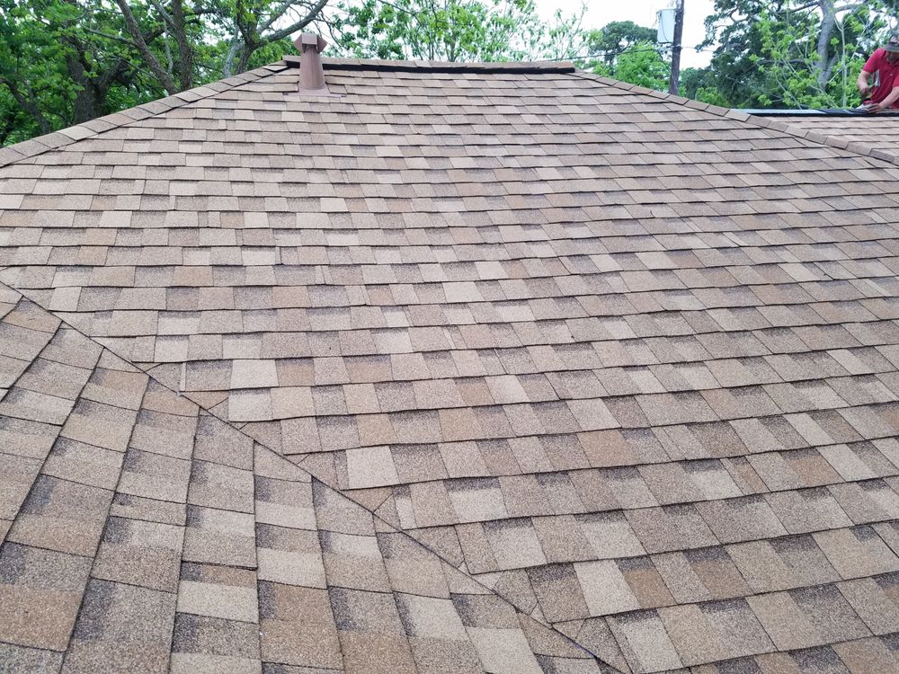 Slide of Houston Roofing Experts