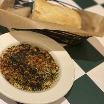 Johnny Carino's - Fresh Baked Bread Oil mix - Italian Near Me - Oklahoma City, Oklahoma Johnny Carino's - Fresh Baked Bread Oil mix - Italian Near Me - Oklahoma City, Oklahoma