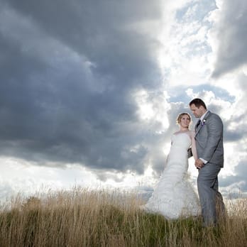 Foto Flare Photography - Bride and groom's wedding photo in front of a dramatic sky - Photographers Near Me - Hamilton, Ontario Foto Flare Photography - Bride and groom's wedding photo in front of a dramatic sky - Photographers Near Me - Hamilton, Ontario
