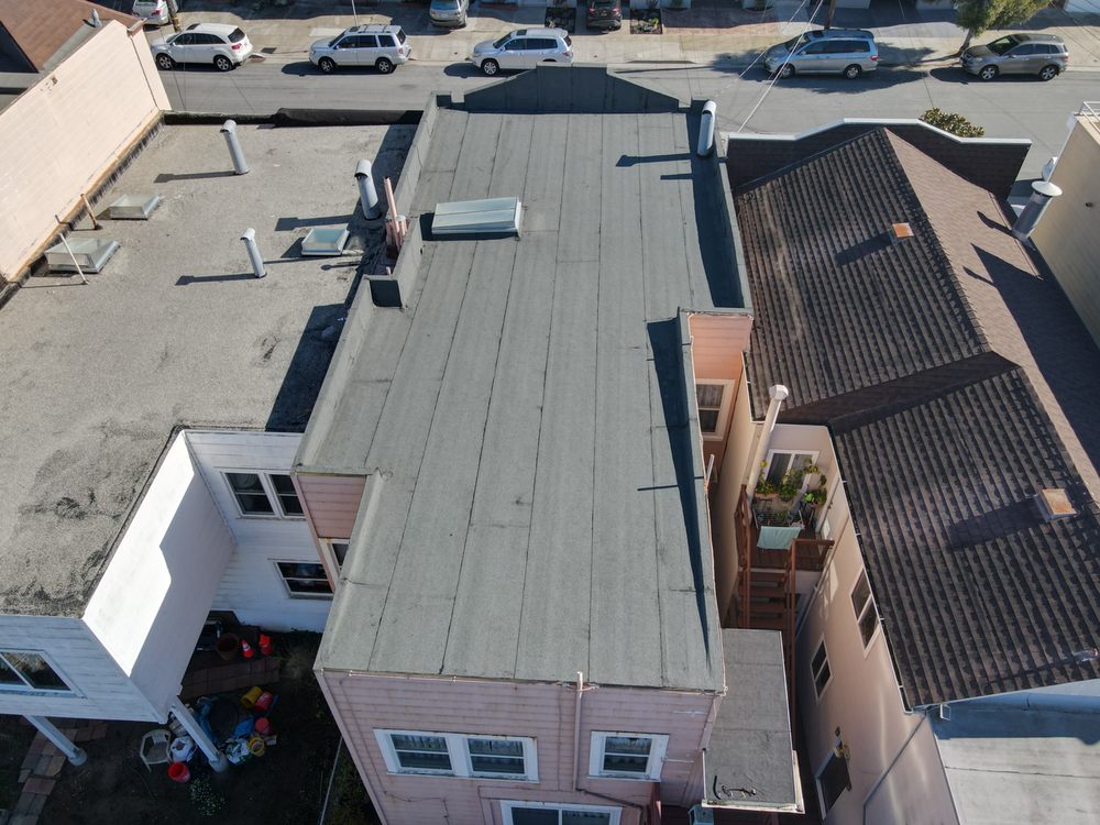 Slide of Apollo Roofing Company