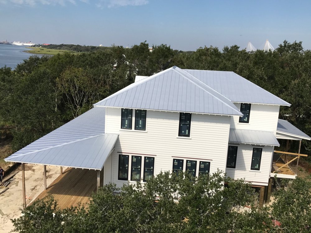 Slide of Canaan roofing and gutters