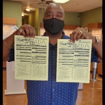 A Bite To Eat - a man wearing a face mask and holding two papers - Food Trucks Near Me - Loganville, Georgia