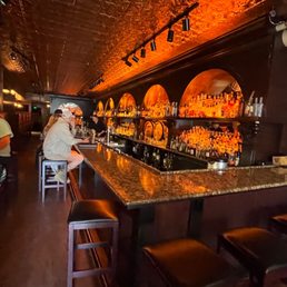 a man sitting at a bar a man sitting at a bar