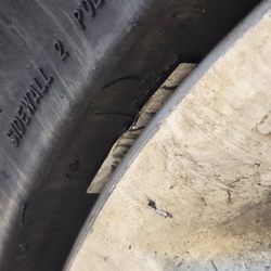 Sam's Tire Repair - Sticker stuck between the rim and tire