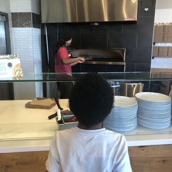 MOD Pizza - This kid loves watching folks make pizza! - Fast Food Near Me - Prosper, Texas