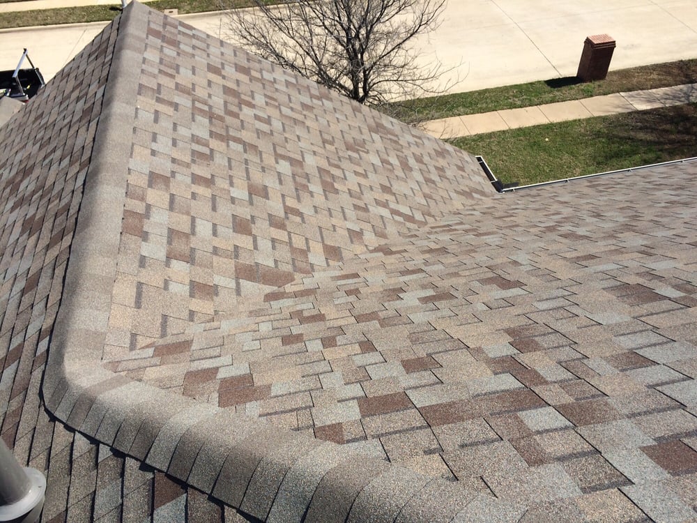 Slide of Whatley Roofing