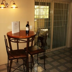 Lucinda's Country Inn - This bistro table is fun to sip wine at or enjoy the table & chairs on the porch.