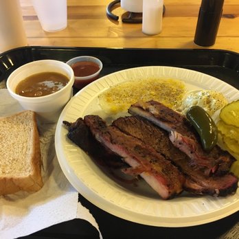 Backwoods BBQ - Pork rib and brisket combo (some bites taken out of the rib;) - Barbeque Near Me - Fredericksburg, Texas Backwoods BBQ - Pork rib and brisket combo (some bites taken out of the rib;) - Barbeque Near Me - Fredericksburg, Texas