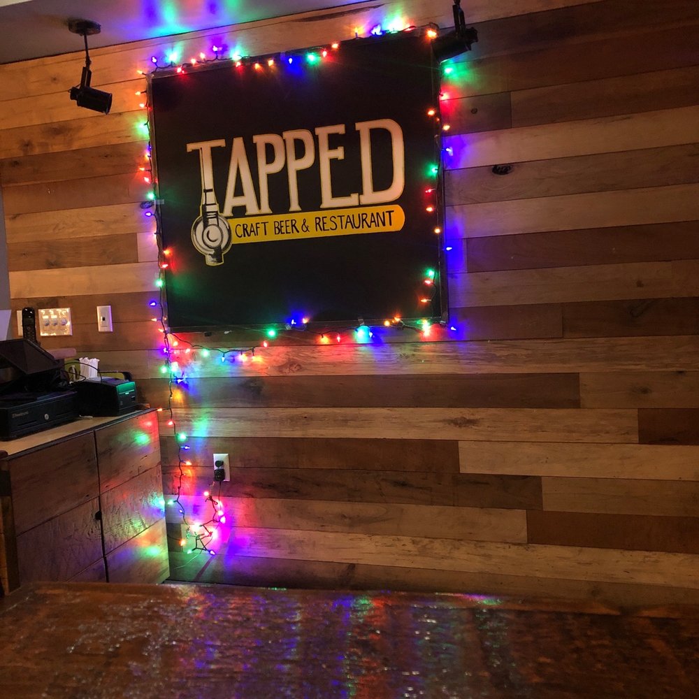 Tapped - a bar with lights on the wall - Cocktail Bars Near Me - Middletown, New York Tapped - a bar with lights on the wall - Cocktail Bars Near Me - Middletown, New York