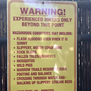 Twin Falls Trail - Warning sign. The hike was not tough but be prepared for mosquitos and to cross a slipper stream - Hiking Near Me - Haiku, Hawaii