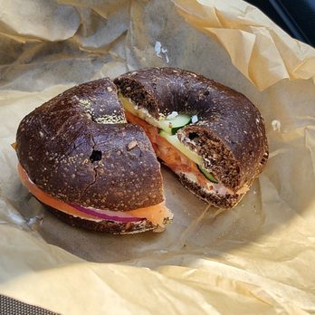 Einstein Bros. Bagels - Lox, cream cheese, onion, cucumber, greens on a pumpernickel bagel! Delicious - Bagels Near Me - Lincolnshire, Illinois