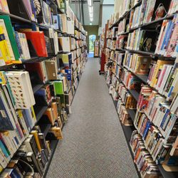 Natchitoches Parish Library - A view of the library's stacks. In addition to the digital card catalog, staff are also available to help patrons locate materials.