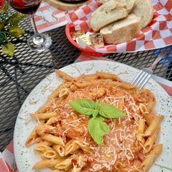 Baked Ziti with fresh basil from their outside potted garden