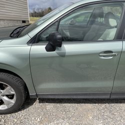 Silver's Auto Service - The scrape on the door, courtesy of Carvana