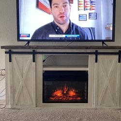 Vintage Factory - They can install an electric fireplace to this tv stand.