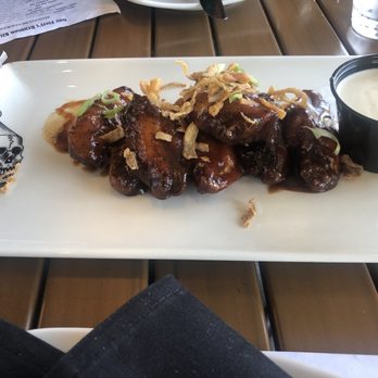 Guy Fieri's Branson Kitchen + Bar - The Barbecue Wings were delicious.  We purchased the sauce before we left. - Bars Near Me - Branson, Missouri