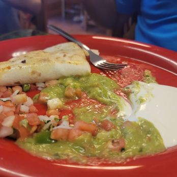 Taqueria Don Chepe - Half eaten quesadilla with runny guacamole! - Mexican Near Me - Pleasanton, California Taqueria Don Chepe - Half eaten quesadilla with runny guacamole! - Mexican Near Me - Pleasanton, California