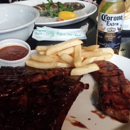Ribs (half rack of lamb) and steak (200g) combo ($49) + Corona ($9).