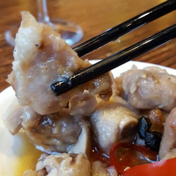 Ginger - Pai gu dim sum...small bites of bone with a tiny bit of meat. Black bean sauce is a clearish sauce with a few whole black beans. - Chinese Near Me - National Harbor, Maryland