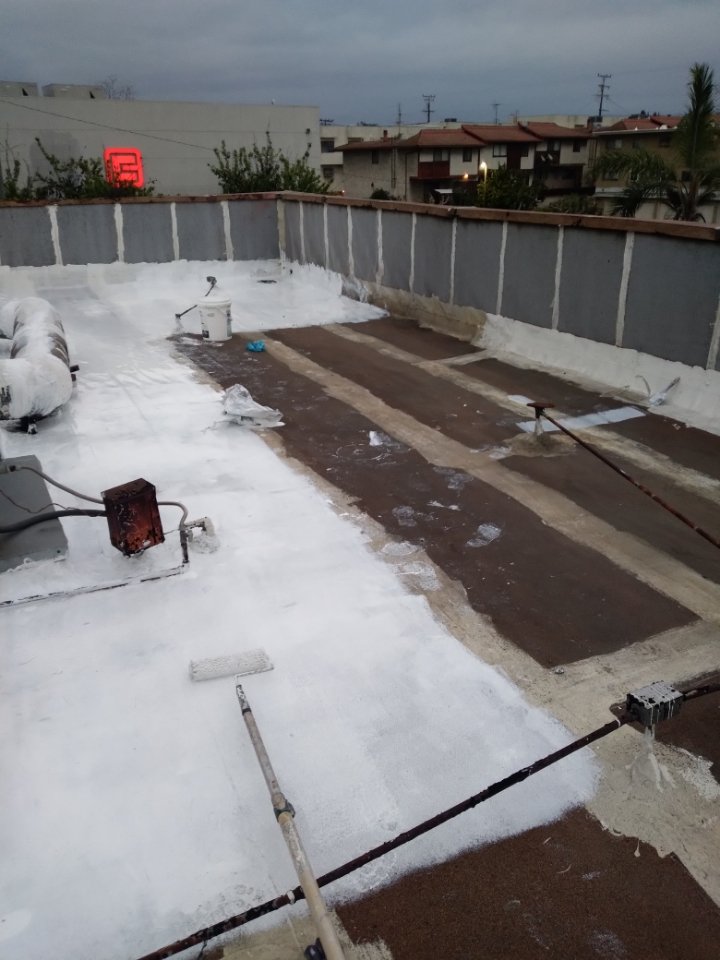 Slide of RR Roofing Service