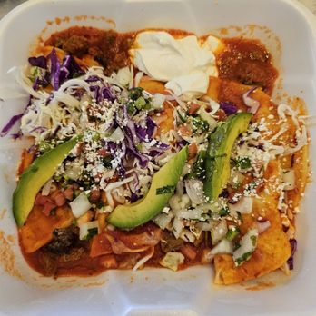 El Fogon - Traditional Enchiladas- skip next time.  The sauce was too tomato-ey, meat needed more flavor, outsized amount of cabbage on top. - Tacos Near Me - Phoenix, Arizona
