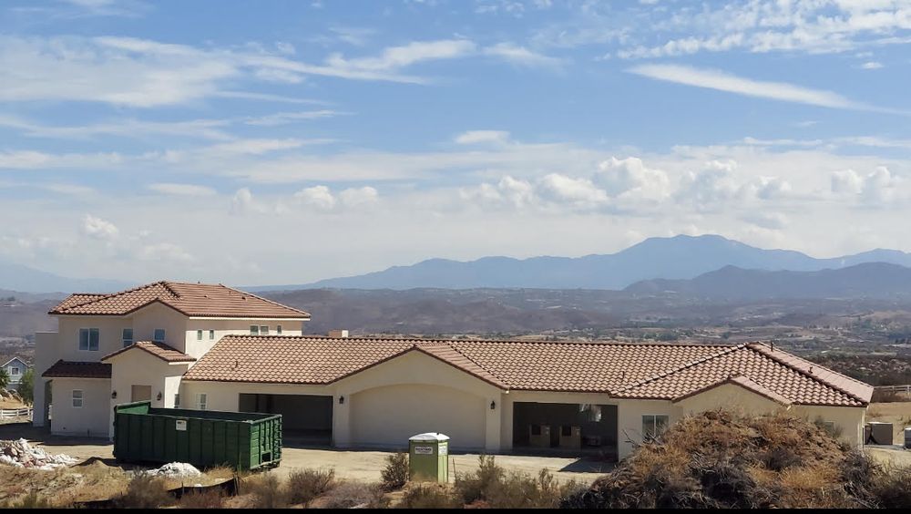 Slide of Midas Roofing