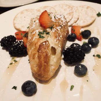 Johnny's Tavern - Amazingly delicious! Baked Brie puff pastry! Drool worthy. Crackers are not needed. The fruit was great. - New American Near Me - Amherst, Massachusetts Johnny's Tavern - Amazingly delicious! Baked Brie puff pastry! Drool worthy. Crackers are not needed. The fruit was great. - New American Near Me - Amherst, Massachusetts