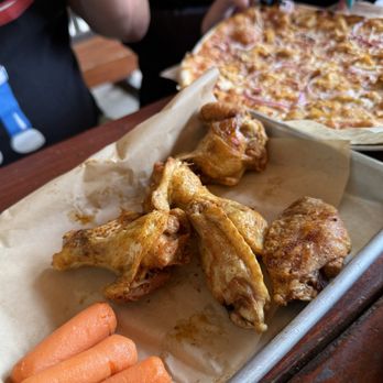Rumor Brewing - formerly Ale Republic - Dry Rub Wings with the Chicken BBQ pizza in the background - Breweries Near Me - Cedar Crest, New Mexico Rumor Brewing - formerly Ale Republic - Dry Rub Wings with the Chicken BBQ pizza in the background - Breweries Near Me - Cedar Crest, New Mexico