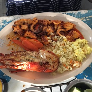 Restaurant Isla de Marin's - Pulpo ajillo (with one of my husbands lobsters) - Seafood Near Me - Puerto Vallarta, JAL
