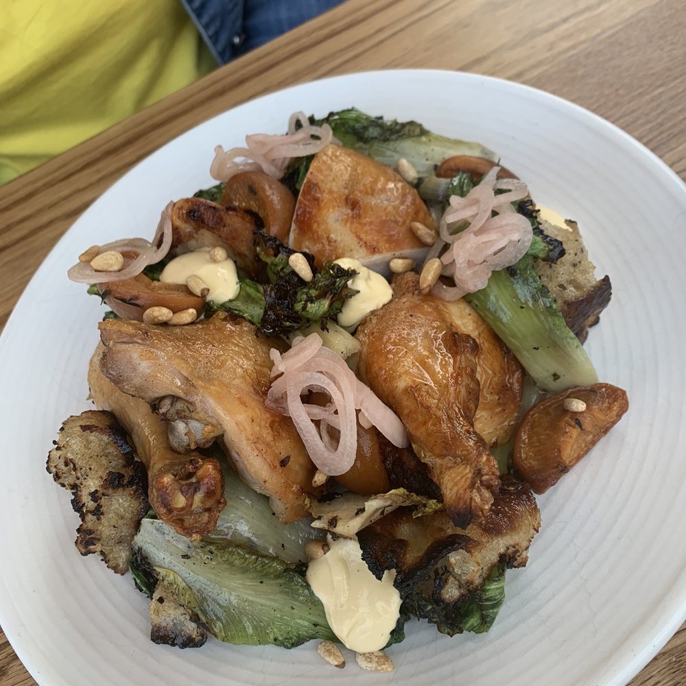 Carrello - My friend's dish: Half Chicken with pence apricot, grilled escarole panzanella, and pine nuts - Italian Near Me - Seattle, Washington