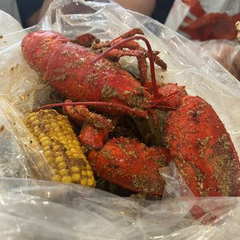 Cajun King Aiea - Custom seafood boil bag with lobster, corn, sausages, mussels, and potatoes. - Seafood Near Me - Aiea, Hawaii