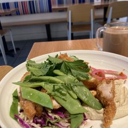 Fried Chicken plate and masala chai latte with a shot of cardamom coffee Fried Chicken plate and masala chai latte with a shot of cardamom coffee
