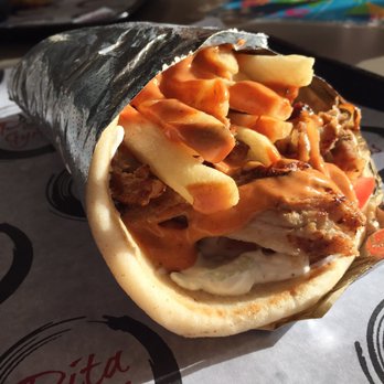 Cedar Cafe - Authentic (Pork gyros, tzatziki, fries, onion, tomato, special sauce on a pita wrap) - Greek Near Me - Norwell, Massachusetts