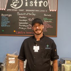Travis, our head chef, carefully crafting exceptional meals for our residents.