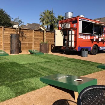 Memorial Trail Ice House - a food truck parked in the background - Sports Bars Near Me - Houston, Texas Memorial Trail Ice House - a food truck parked in the background - Sports Bars Near Me - Houston, Texas