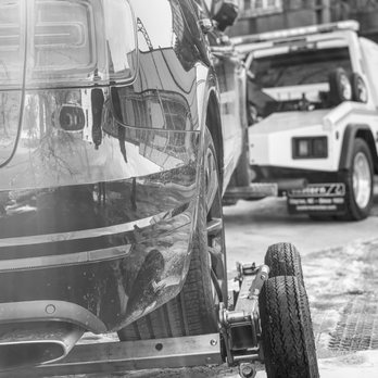 Justins Towing - Justins towing carefully and safely towing a 170,00 Bentley truck with dollies - Towing Near Me - Ozone Park, New York