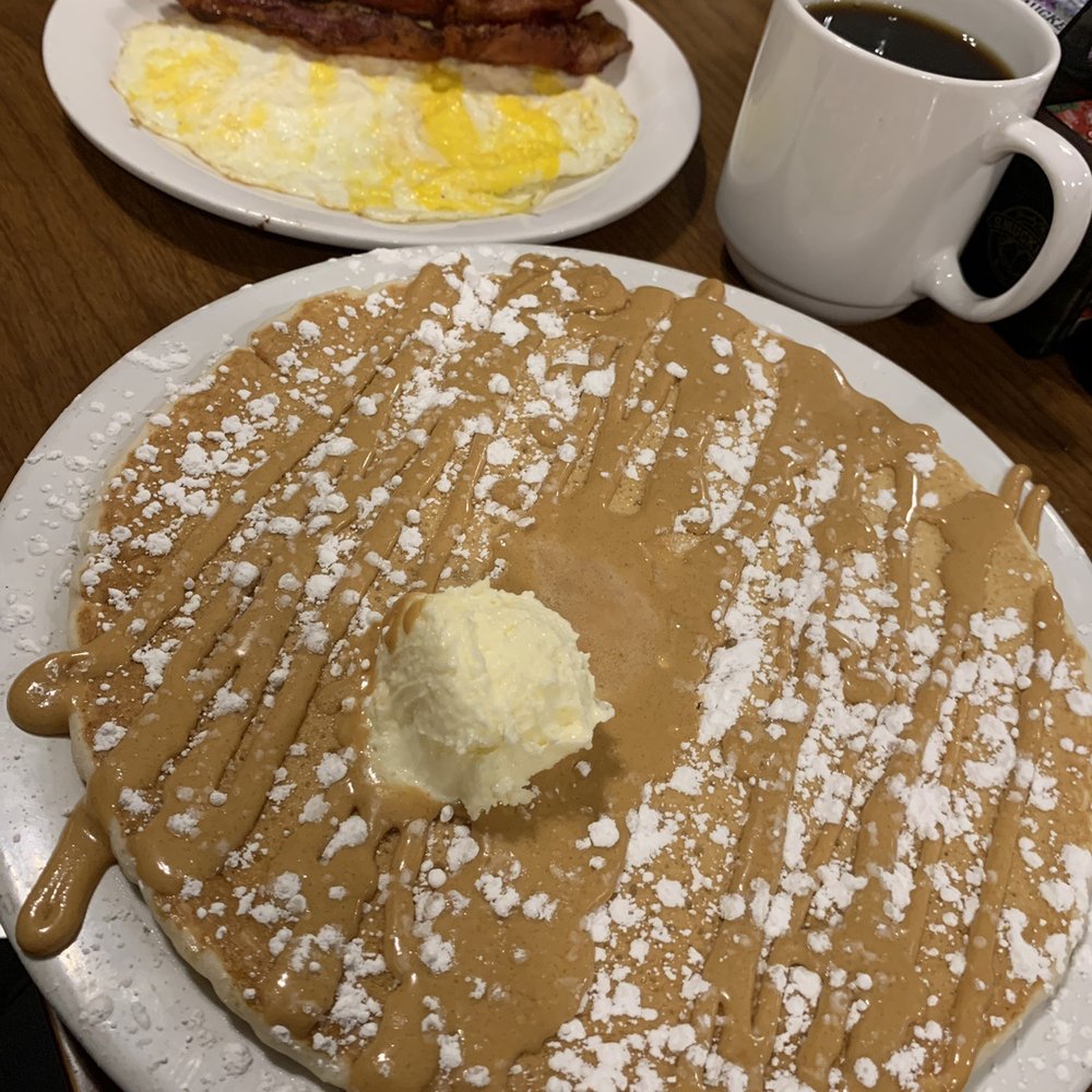 Crackin' & Stackin' - Single banana stackin' with peanut butter topping. Side of eggs and bacon. Cup of Good Bean coffee. - Breakfast & Brunch Near Me - Central Point, Oregon Crackin' & Stackin' - Single banana stackin' with peanut butter topping. Side of eggs and bacon. Cup of Good Bean coffee. - Breakfast & Brunch Near Me - Central Point, Oregon