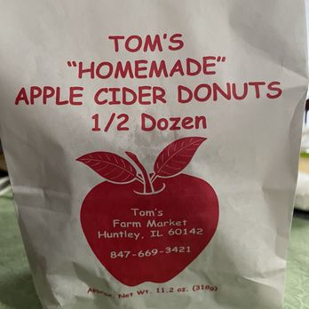 Tom's Farm Market - A pack of half dozen apple cider donuts available year round. - Farmers Market Near Me - Huntley, Illinois Tom's Farm Market - A pack of half dozen apple cider donuts available year round. - Farmers Market Near Me - Huntley, Illinois