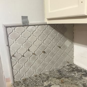 Acadian Chimney & Construction - Backsplash - Roofing Near Me