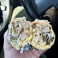 Tortilleria Y Panaderia Las 4 Americas -Taqueria Express - Asada Breakfast Burrito - Meh, not impressed honestly. Basically uncooked/boiled potatoes, overcooked/tough steak and barely any cheese.