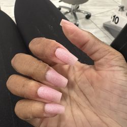 Nations Nail - This is at the salon as she tried to cover it so I would not notice she cut me.