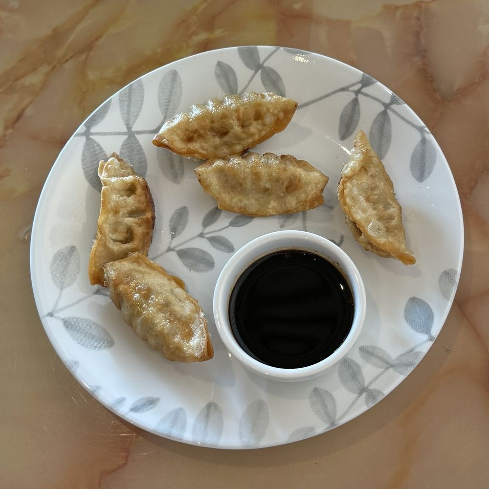 Dan's Thai Cuisine - A6. Pork Dumplings - Thai Near Me - Omaha, Nebraska Dan's Thai Cuisine - A6. Pork Dumplings - Thai Near Me - Omaha, Nebraska