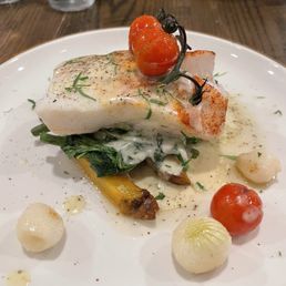 seared cod on top of a small pile of a few French fries, green beans & spinach (+ 2 pairs of cherry tomatoes & pearl onions) seared cod on top of a small pile of a few French fries, green beans & spinach (+ 2 pairs of cherry tomatoes & pearl onions)
