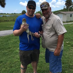 Eagle Bay Airboat Rides - Holding Duke along with Captain Troy!!