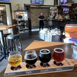 Flight of Craft Beer and our lovely server-Courtney Flight of Craft Beer and our lovely server-Courtney