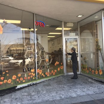 Bee Honey - a woman standing in front of a store - Honey Near Me - Lancaster, California Bee Honey - a woman standing in front of a store - Honey Near Me - Lancaster, California