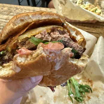 Burning Buns - The southerner burger (with truffle fries in the back) - Food Trucks Near Me
